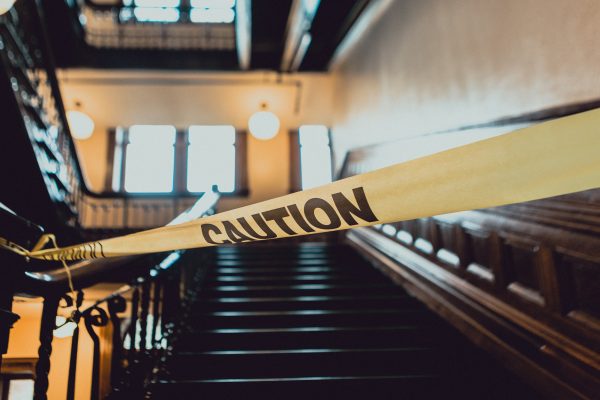 Caution Tape in Front of Stairs