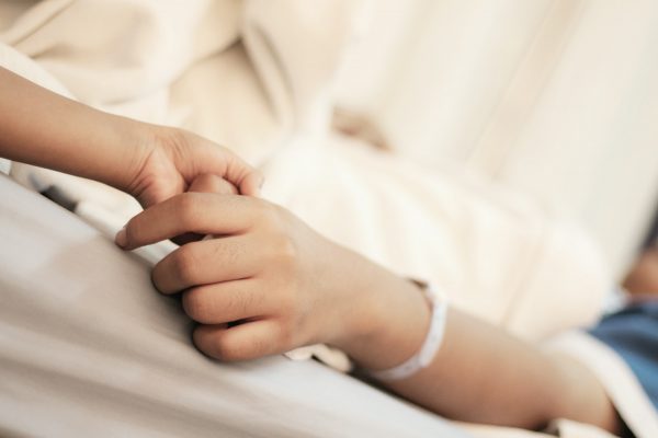 Hands of patients and relatives